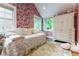 Charming bedroom with floral wallpaper, white wardrobe, and natural light from two windows at 657 E Paces Ferry Ne Rd, Atlanta, GA 30305