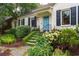 Inviting front entrance with landscaped steps leading to the home at 657 E Paces Ferry Ne Rd, Atlanta, GA 30305