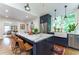 Modern kitchen with a large center island, stainless steel appliances, and a farmhouse sink at 657 E Paces Ferry Ne Rd, Atlanta, GA 30305