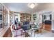Spacious living room featuring built-in bookshelves and hardwood floors at 657 E Paces Ferry Ne Rd, Atlanta, GA 30305