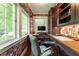 Inviting home office with custom built ins, wood floors and natural light at 657 E Paces Ferry Ne Rd, Atlanta, GA 30305