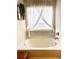 Bright bathtub with stylish sheer curtains and decorative hanging plant at 110 Serendipity Way, Dallas, GA 30157