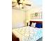 Bedroom with neutral colors and a quilted bedspread at 110 Serendipity Way, Dallas, GA 30157