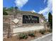 A stone community sign surrounded by landscaping, marking the entrance to Vista Lake at 110 Serendipity Way, Dallas, GA 30157
