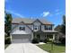 Two story traditional home with an attached two car garage, landscaped front yard and covered porch at 110 Serendipity Way, Dallas, GA 30157