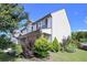 Charming two-story home with light siding, black shutters, and professional landscaping at 110 Serendipity Way, Dallas, GA 30157