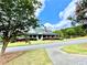 A beautifully landscaped property with well-manicured lawn and vibrant flowerbeds at 110 Serendipity Way, Dallas, GA 30157