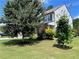 Lovely single Gathering home featuring a large front yard, mature landscaping, and a covered front porch at 110 Serendipity Way, Dallas, GA 30157
