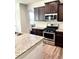 Well-appointed kitchen with stainless steel appliances and granite countertops at 110 Serendipity Way, Dallas, GA 30157