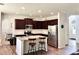Bright kitchen with granite island, stainless steel appliances, and open floor plan at 110 Serendipity Way, Dallas, GA 30157