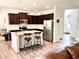 Spacious kitchen with granite island, stainless steel appliances, and ample cabinet space at 110 Serendipity Way, Dallas, GA 30157