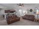 Spacious living room open to kitchen featuring hard surface floors and comfortable seating at 110 Serendipity Way, Dallas, GA 30157