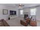 Cozy living room with fireplace, neutral carpet, and ample natural light at 110 Serendipity Way, Dallas, GA 30157