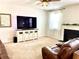 Living room featuring large screen tv, decor, and fireplace at 110 Serendipity Way, Dallas, GA 30157