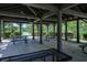 Interior of the pavilion overlooking the water, features picnic tables to enjoy outdoor gatherings and the lake view at 110 Serendipity Way, Dallas, GA 30157