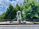 Community playground with slide, climbing stairs, and protective fencing at 110 Serendipity Way, Dallas, GA 30157
