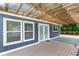 Covered back porch featuring an outdoor seating area at 4002 Joshua Ln, Douglasville, GA 30135