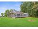 Expansive backyard featuring a large deck and lush green lawn at 4002 Joshua Ln, Douglasville, GA 30135