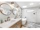 Elegant bathroom with double vanity, soaking tub, and stylish tile work at 4002 Joshua Ln, Douglasville, GA 30135