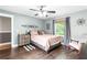 Bright bedroom featuring hardwood floors and a soft color palette at 4002 Joshua Ln, Douglasville, GA 30135