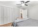 Bright bedroom showcasing a closet and an open doorway to another room at 4002 Joshua Ln, Douglasville, GA 30135
