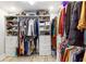 Walk-in closet featuring custom shelving and ample storage space for clothing at 4002 Joshua Ln, Douglasville, GA 30135