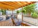 Cozy covered deck with comfortable seating offers a relaxing outdoor space at 4002 Joshua Ln, Douglasville, GA 30135