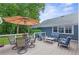 Open deck with stylish outdoor furniture is ideal for enjoying the surrounding scenery and socializing at 4002 Joshua Ln, Douglasville, GA 30135