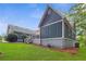 Attractive home featuring a connected wooden deck is perfect for outdoor entertaining at 4002 Joshua Ln, Douglasville, GA 30135