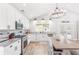 Modern kitchen features granite countertops, stainless steel appliances, and a cozy breakfast nook at 4002 Joshua Ln, Douglasville, GA 30135