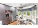 Eat-in kitchen with stainless-steel refrigerator, breakfast nook, and a window at 4002 Joshua Ln, Douglasville, GA 30135