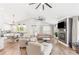 Open-concept living area featuring a vaulted ceiling, two sofas, and hardwood floors at 4002 Joshua Ln, Douglasville, GA 30135