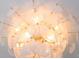 Close-up of a striking modern chandelier with translucent accents adding elegance to the space at 1312 Becket Ne Dr, Brookhaven, GA 30319