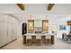 Modern kitchen with large island, pendant lighting, and open dining area at 1312 Becket Ne Dr, Brookhaven, GA 30319