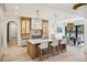 Contemporary kitchen with large island, pendant lighting, and open floor plan at 1312 Becket Ne Dr, Brookhaven, GA 30319