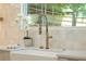 Kitchen sink with spring faucet near a window at 1312 Becket Ne Dr, Brookhaven, GA 30319