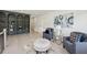 Sitting area with hardwood floors, chairs, and a bookcase at 1312 Becket Ne Dr, Brookhaven, GA 30319