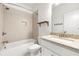 Clean bathroom with a tiled shower, granite countertop, and a modern design at 2140 Colvin Nw Ct, Atlanta, GA 30318
