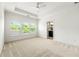 Bright and spacious bedroom with a large window and an ensuite bathroom entrance at 2140 Colvin Nw Ct, Atlanta, GA 30318
