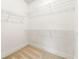 Walk-in closet with wire shelving ready to organize your wardrobe at 2140 Colvin Nw Ct, Atlanta, GA 30318