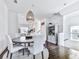 Bright dining room features hardwood floors, modern lighting, and adjacent storage unit at 2140 Colvin Nw Ct, Atlanta, GA 30318