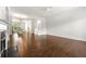 Open concept living room with hardwood floors, a fireplace, and ample space for entertaining at 2140 Colvin Nw Ct, Atlanta, GA 30318