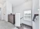 Bright staircase landing with natural light and modern accents at 2140 Colvin Nw Ct, Atlanta, GA 30318