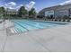 Large community swimming pool with lounge chairs, umbrellas and a clear blue sky at 2140 Colvin Nw Ct, Atlanta, GA 30318