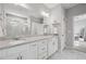 Bathroom view shows white cabinets, granite countertop, dual sinks, and a tiled walk-in shower at 3116 Quantum Ln, Atlanta, GA 30341