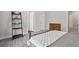 Bedroom featuring a wrought iron bed frame, small shelf, and dresser at 3116 Quantum Ln, Atlanta, GA 30341
