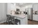 Well-equipped kitchen with granite counters, stainless steel appliances, and a breakfast bar at 3116 Quantum Ln, Atlanta, GA 30341