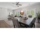 Open concept living room with contemporary furnishings and lots of natural light at 3116 Quantum Ln, Atlanta, GA 30341