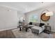 Inviting living room showcases stylish decor, comfortable seating, and wood flooring at 3116 Quantum Ln, Atlanta, GA 30341