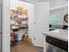 Walk-in pantry with organized shelving, providing ample storage space at 3116 Quantum Ln, Atlanta, GA 30341